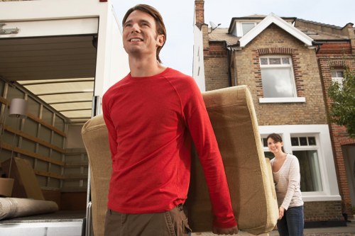 Moving boxes and furniture being loaded for removals in Elephant and Castle