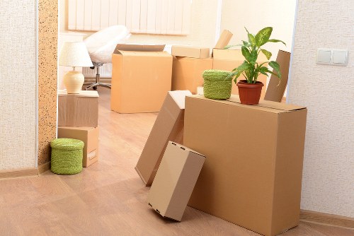 Local removals team handling furniture for a home move in Elephantandcastle