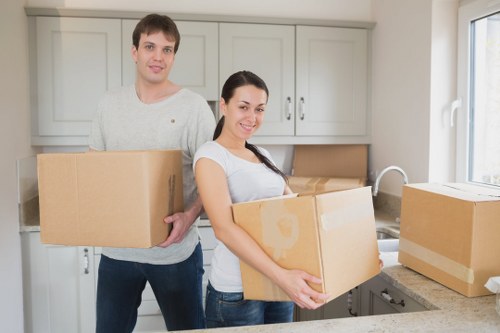 Staff preparing boxes and equipment for an office relocation in Elephant and Castle